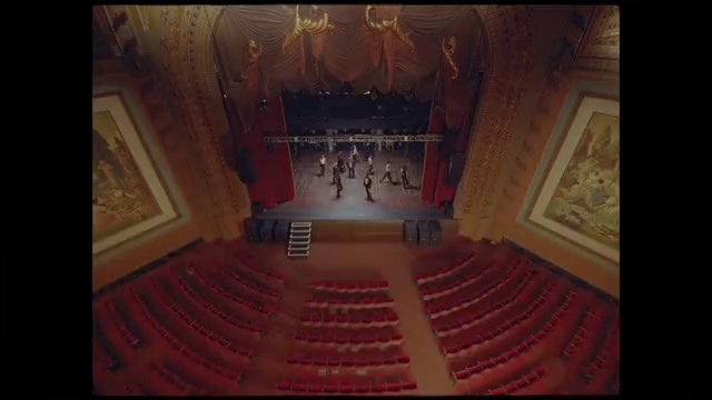 Video Reference: Chair, Musical instrument accessory, Entertainment, Stairs, Hall, Performing arts center, Event, Symmetry, Movie palace, Wood