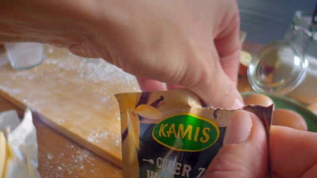 Video Reference: Fluid, Finger, Thumb, Nail, Junk food, Drink, Packing materials, Wood, Food, Logo