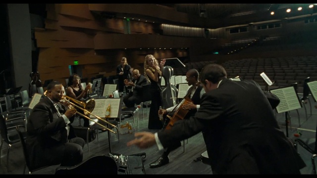 Video Reference: Music stand, Musical instrument, Musician, Chair, Musical instrument accessory, Classical music, Brass instrument, Music, Suit, Violin family