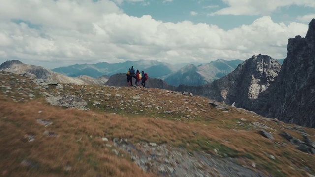 Video Reference: Cloud, Sky, Mountain, Slope, Terrain, Bedrock, Landscape, Grassland, Formation, Valley
