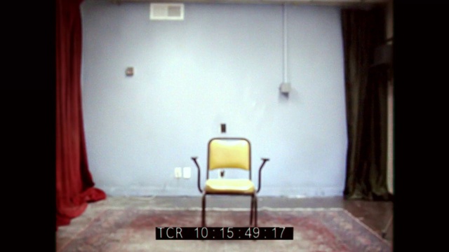 Video Reference: Chair, Curtain, Interior design, Fixture, Building, Tints and shades, Comfort, Flooring, Wood, Rectangle