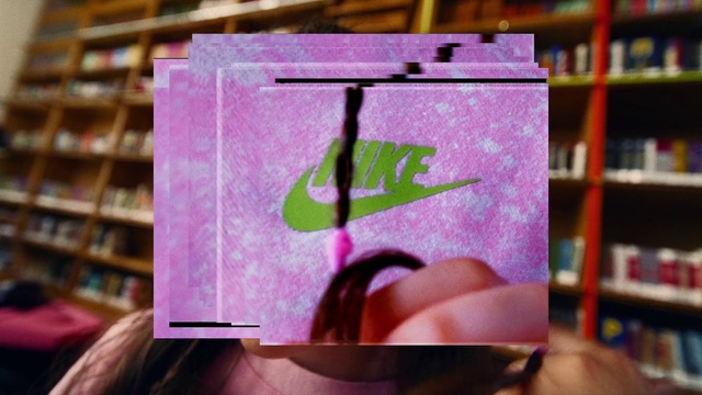 Video Reference: Purple, Shelf, Wood, Bookcase, Pink, Violet, Font, Art, Material property, Magenta