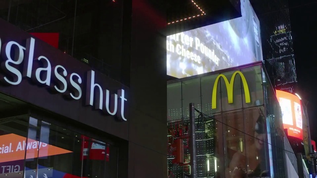 Video Reference: Building, Font, City, Facade, Electronic signage, Display device, Metropolitan area, Metropolis, Signage, Commercial building