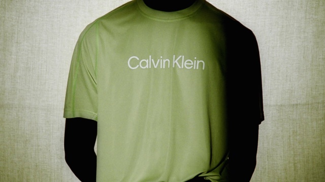 Video Reference: Jersey, Sleeve, Grey, Sportswear, Font, Active shirt, T-shirt, Gadget, Magenta, Electric blue