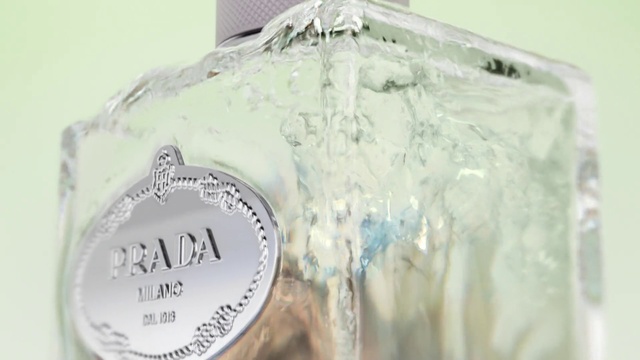 Video Reference: Liquid, Sleeve, Fluid, Font, Glass, Drinking water, Freezing, Glass bottle, Fashion accessory, Paint