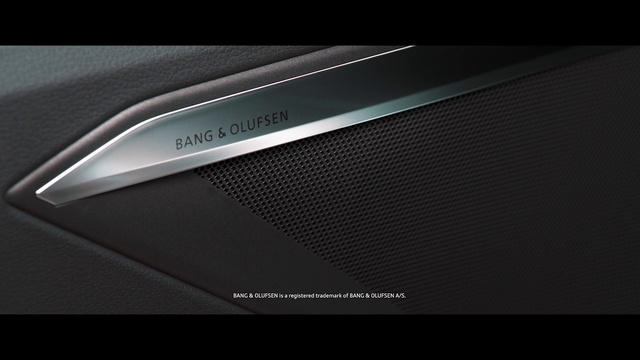 Video Reference: Personal luxury car, Audio equipment, Font, Automotive design, Grille, Gadget, Carbon, Automotive exterior, Electric blue, Communication Device