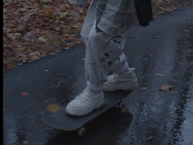Video Reference: Shoe, Road surface, Asphalt, Automotive tire, Thigh, Grey, Walking shoe, Outdoor shoe, Knee, Denim