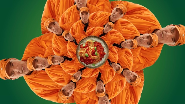 Video Reference: Orange, Temple, Organism, Hat, Fun, Event, Guru, Tradition, Peach, Happy