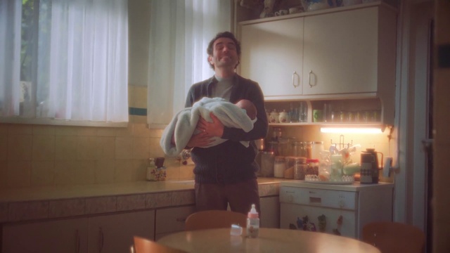 Video Reference: Smile, Table, Cabinetry, Picture frame, Gesture, Tableware, Window, Curtain, Kitchen, Countertop