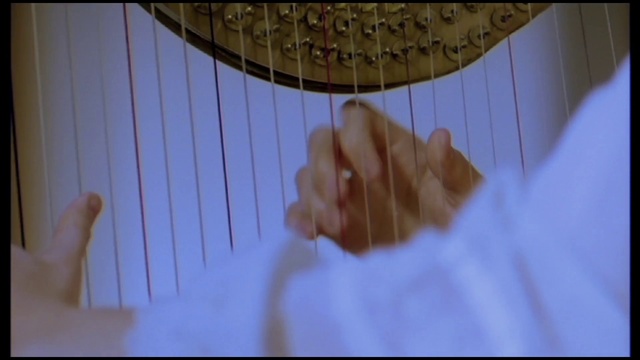 Video Reference: Arm, Musical instrument, Gesture, Finger, Thumb, Tints and shades, Wrist, Wood, Pattern, Nail