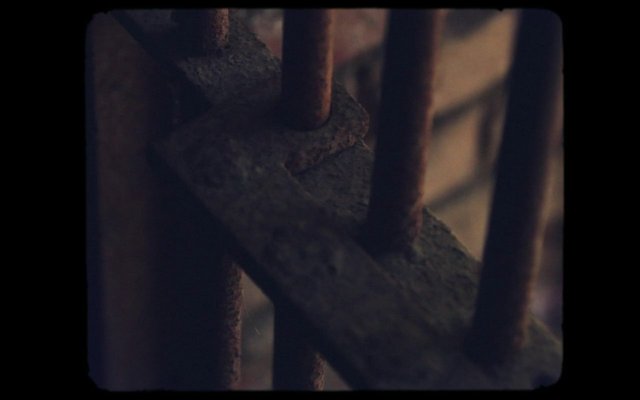 Video Reference: rust, metal, bars, texture, close-up, dark, shallow focus, industrial, weathered, abstract