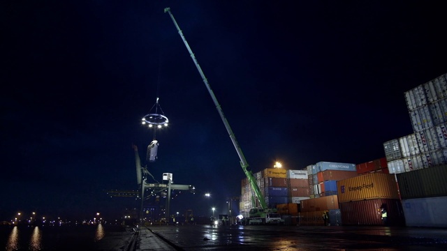 Video Reference: Sky, Building, Street light, Infrastructure, Electricity, Road surface, Automotive lighting, Tower, Midnight, Cloud