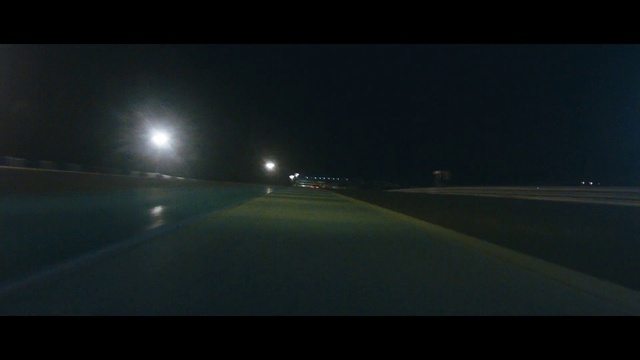 Video Reference: Atmosphere, Automotive lighting, Street light, Road surface, Sky, Asphalt, Midnight, Tints and shades, Horizon, Headlamp