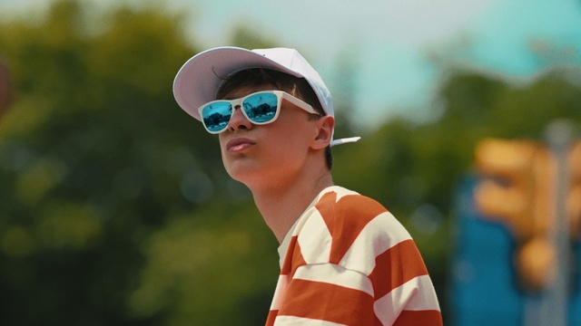 Video Reference: Glasses, Vision care, Goggles, Cap, Sunglasses, Eyewear, Flash photography, Happy, Headgear, Baseball cap