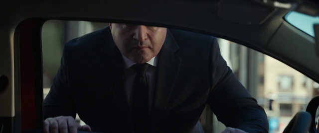 Video Reference: Tie, Dress shirt, Flash photography, Hat, Gesture, Collar, Automotive design, Sun hat, Blazer, Formal wear