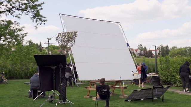 Video Reference: Cloud, Sky, Plant, Tree, Vehicle, Shorts, Grass, Shade, Leisure, Grassland