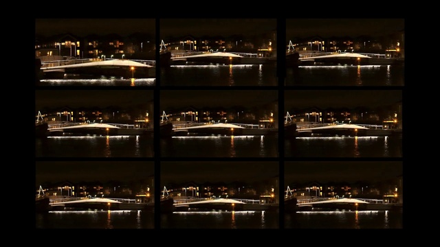 Video Reference: Building, Water, Architecture, Body of water, Electricity, City, Landmark, Midnight, Cityscape, Waterway