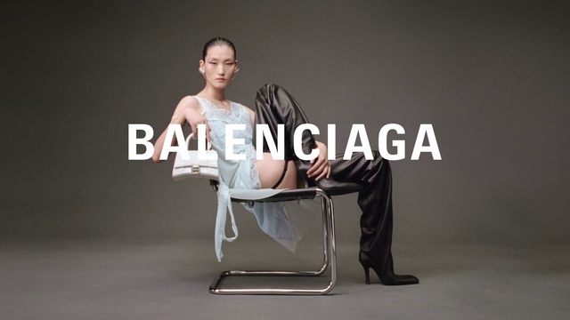 Video Reference: Shoulder, Arm, Furniture, Comfort, Flash photography, Chair, Automotive design, Font, Armrest, Knee