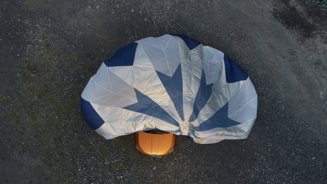 Video Reference: Road surface, Asphalt, Tints and shades, Electric blue, Automotive tire, Landscape, Art, Circle, Automotive wheel system, Tree