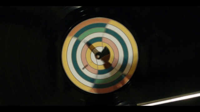 Video Reference: Eye, Gas, Automotive design, Circle, Indoor games and sports, Font, Spiral, Electric blue, Wood, Space