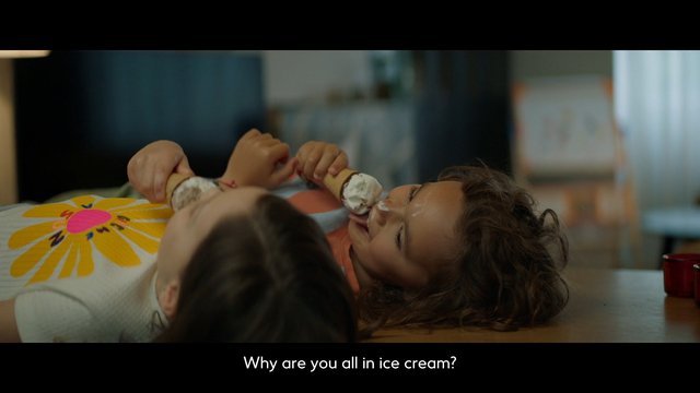 Video Reference: children, ice cream, playful, eating, table, home interior, messy, dessert, face close-up, family, indoor, toddler, snack