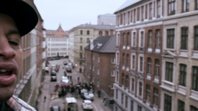 Video Reference: Building, Window, Car, Vehicle, Sky, Urban design, Hat, Thoroughfare, Tower block, City