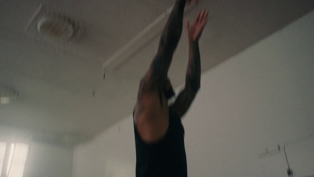 Video Reference: Arm, Gesture, Grey, Waist, Wood, Elbow, Tints and shades, Trunk, Thigh, Flash photography