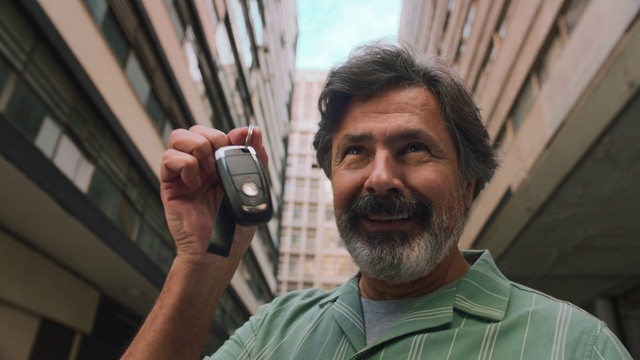 Video Reference: Window, Beard, Building, Eyewear, Smile, Sky, Audio equipment, Communication Device, Gadget, Moustache