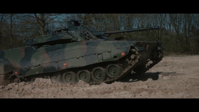 Video Reference: Self-propelled artillery, Tank, Vehicle, Combat vehicle, Wheel, Automotive tire, Armored car, Tree, Armored car, Gun turret