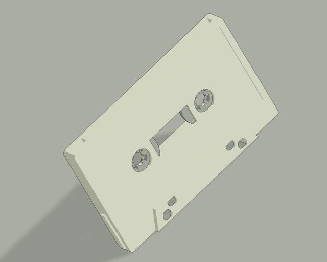 Video Reference: cassette, tape, audio, vintage, retro, blank, magnetic, media, plastic, close-up, isolated, gray background