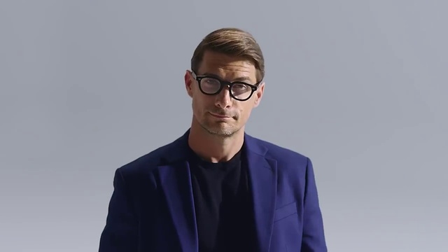 Video Reference: Forehead, Glasses, Face, Chin, Outerwear, Arm, Vision care, Eyewear, Coat, Sleeve