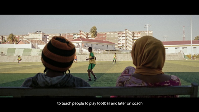 Video Reference: World, Building, Player, Sky, Gesture, Sports equipment, Grass, Competition event, Baseball field, Fan