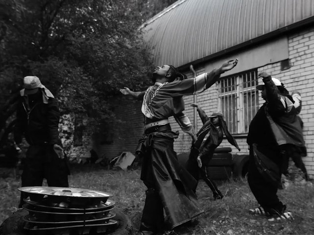 Video Reference: black and white, dance, dancers, outdoor, group, pose, performance, brick building, urban, fashion, motion, dramatic, artistic, grayscale