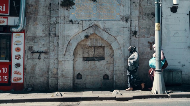 Video Reference: Window, Azure, Building, Door, Grey, Road surface, Art, Sidewalk, Road, City