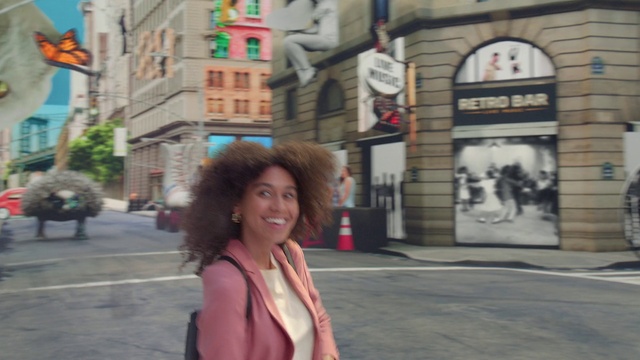 Video Reference: Building, Smile, Window, Infrastructure, Street fashion, Public space, Travel, People, Sidewalk, Eyewear