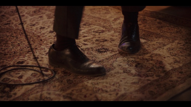 Video Reference: Wood, Sky, Grey, Flooring, Floor, Thigh, Road surface, People in nature, Grass, Foot