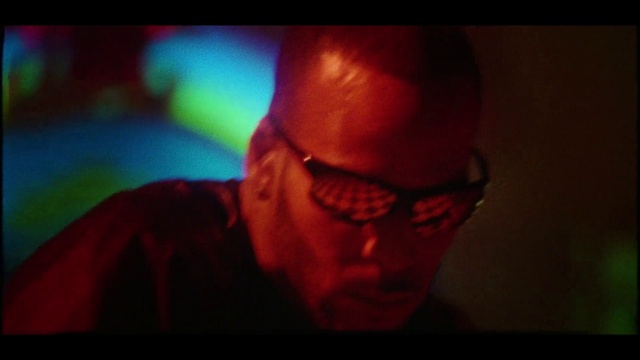 Video Reference: Vision care, Flash photography, Jaw, Eyewear, Entertainment, Magenta, Facial hair, Performing arts, Event, Electric blue