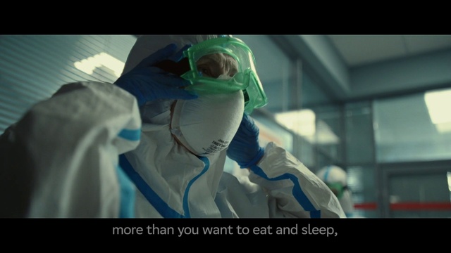 Video Reference: Jaw, Vision care, Electric blue, Service, Personal protective equipment, Event, Eyewear, Font, Science, Photo caption