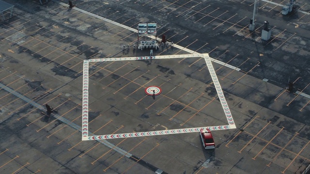 Video Reference: Urban design, Slope, Composite material, Asphalt, Parallel, Engineering, Pattern, Symmetry, Road surface, Space