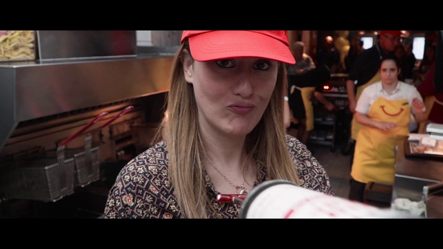 Video Reference: Lip, Mouth, Flash photography, Automotive lighting, T-shirt, Eyewear, Fun, Magenta, Cap, Beauty