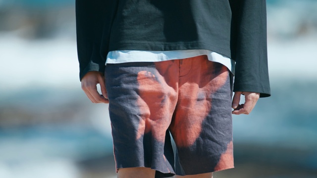 Video Reference: Shorts, Hand, Outerwear, Arm, Leg, Dress, Human body, Sleeve, Waist, Knee