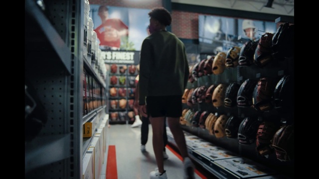 Video Reference: Shelf, Standing, Automotive design, Customer, Shelving, Sportswear, Retail, Helmet, Personal protective equipment, Denim