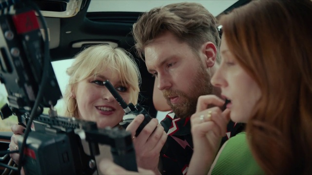 Video Reference: Gesture, Motor vehicle, Beard, Eyewear, Event, Fun, Blond, Cinematographer, Auto part, Conversation