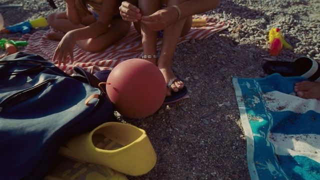 Video Reference: Shorts, Fun, Leisure, Thigh, Grass, Recreation, Human leg, Foot, Event, Toy