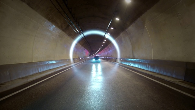 Video Reference: Infrastructure, Electricity, Mode of transport, Road surface, Thoroughfare, Tunnel, Road, Asphalt, Symmetry, Tints and shades