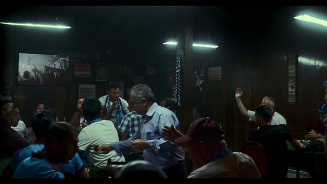 Video Reference: Hat, T-shirt, Event, Entertainment, Fun, Crowd, Conversation, Audience, Darkness, Room