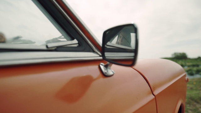 Video Reference: Automotive side-view mirror, Vehicle, Car, Automotive lighting, Hood, Motor vehicle, Sky, Automotive design, Automotive mirror, Mirror