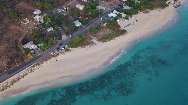 Video Reference: Water, Water resources, Building, Azure, Beach, Tree, Coastal and oceanic landforms, House, Landscape, Seaside resort