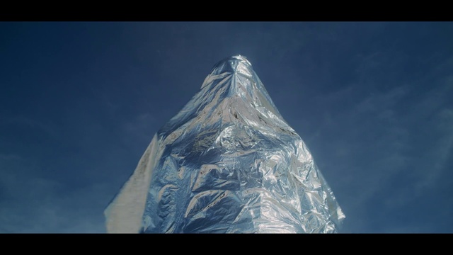 Video Reference: Sky, Mountain, Triangle, Pyramid, Natural landscape, Art, Rectangle, Font, Electric blue, Transparent material