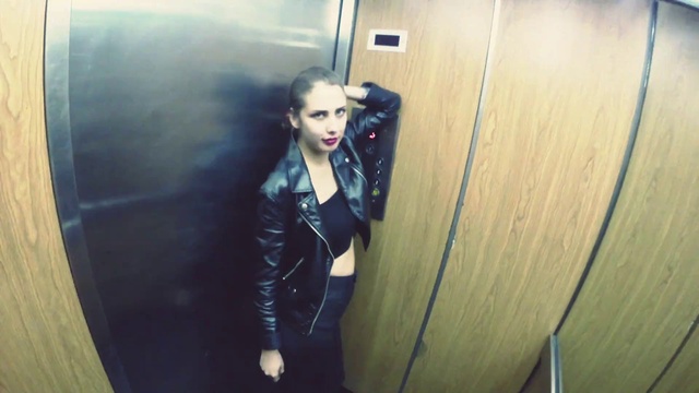 Video Reference: Hairstyle, Shoulder, Leg, Flash photography, Standing, Waist, Latex, Jacket, Street fashion, Thigh